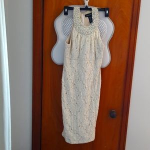Formal dress size 4, cream with gold glitter and pearl neck